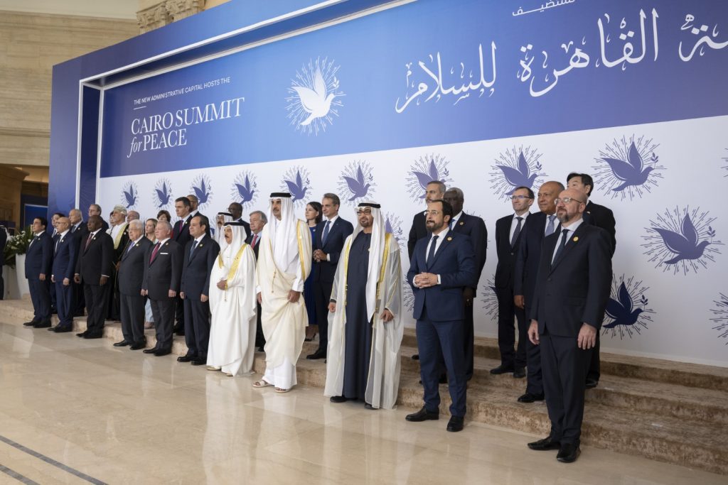 President of the UAE (front row 3rd R) stands for a photograph, during the Cairo Summit for Peace, 